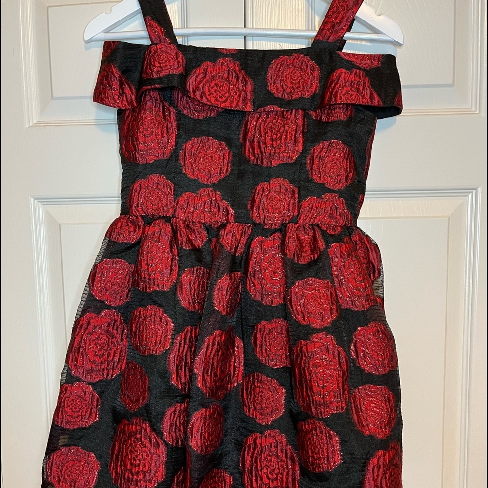 Girls off the shoulder black dress with metallic red rose design